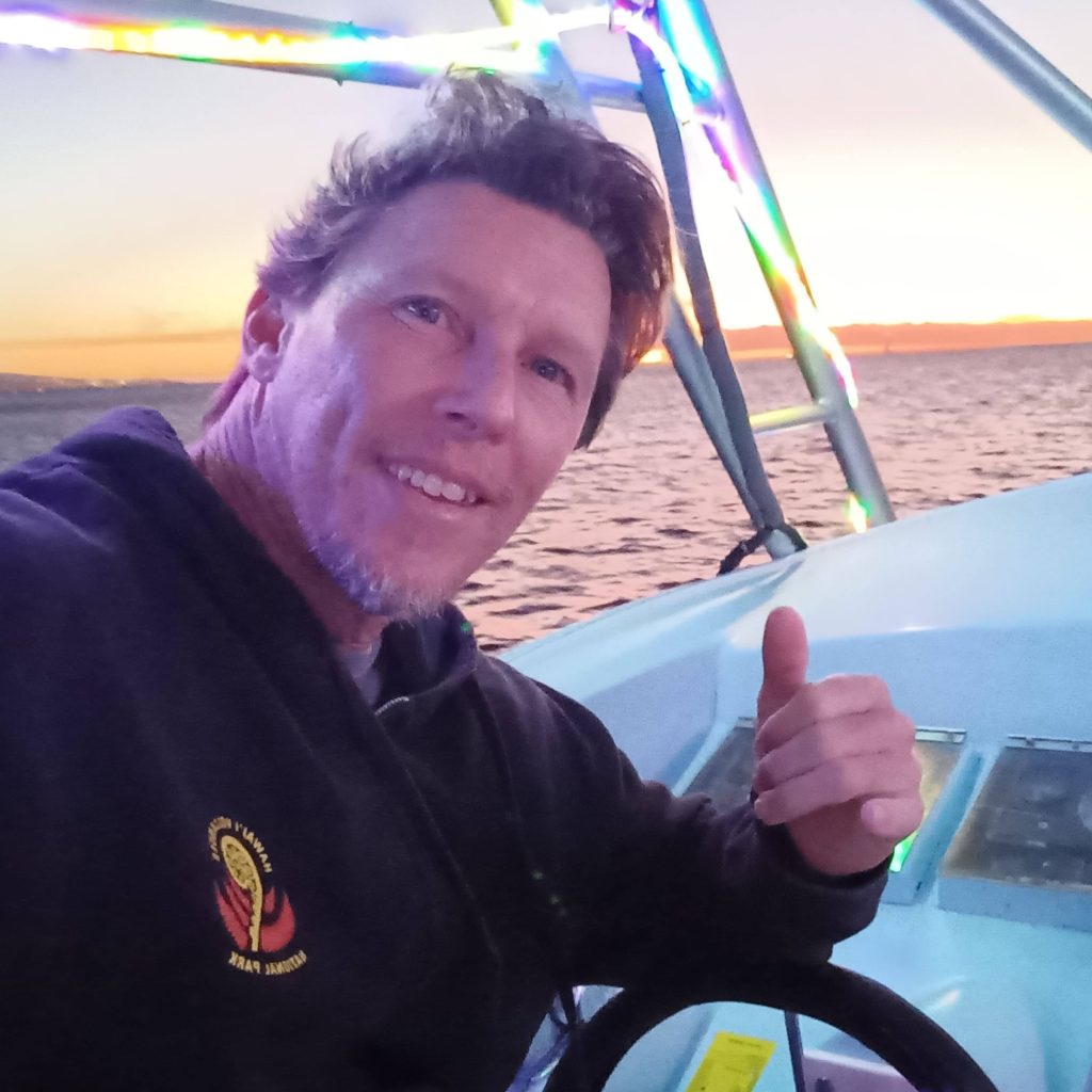 Capt. Jim, Owner of Horizon Ocean Charters at the helm of one of many beautiful vessels he regularly uses to help his clients create amazing memories with family and friends.